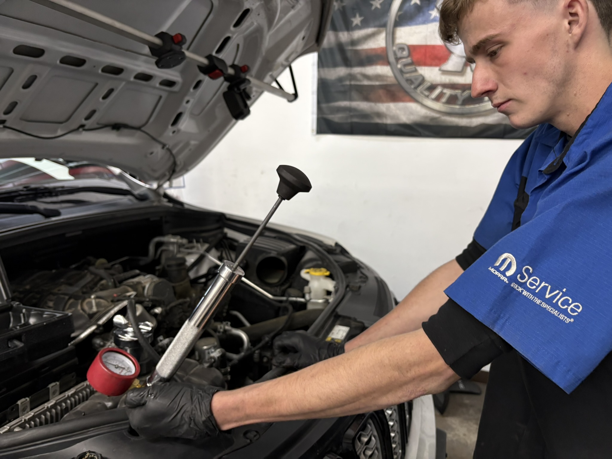 Technician reviewing live diagnostic data